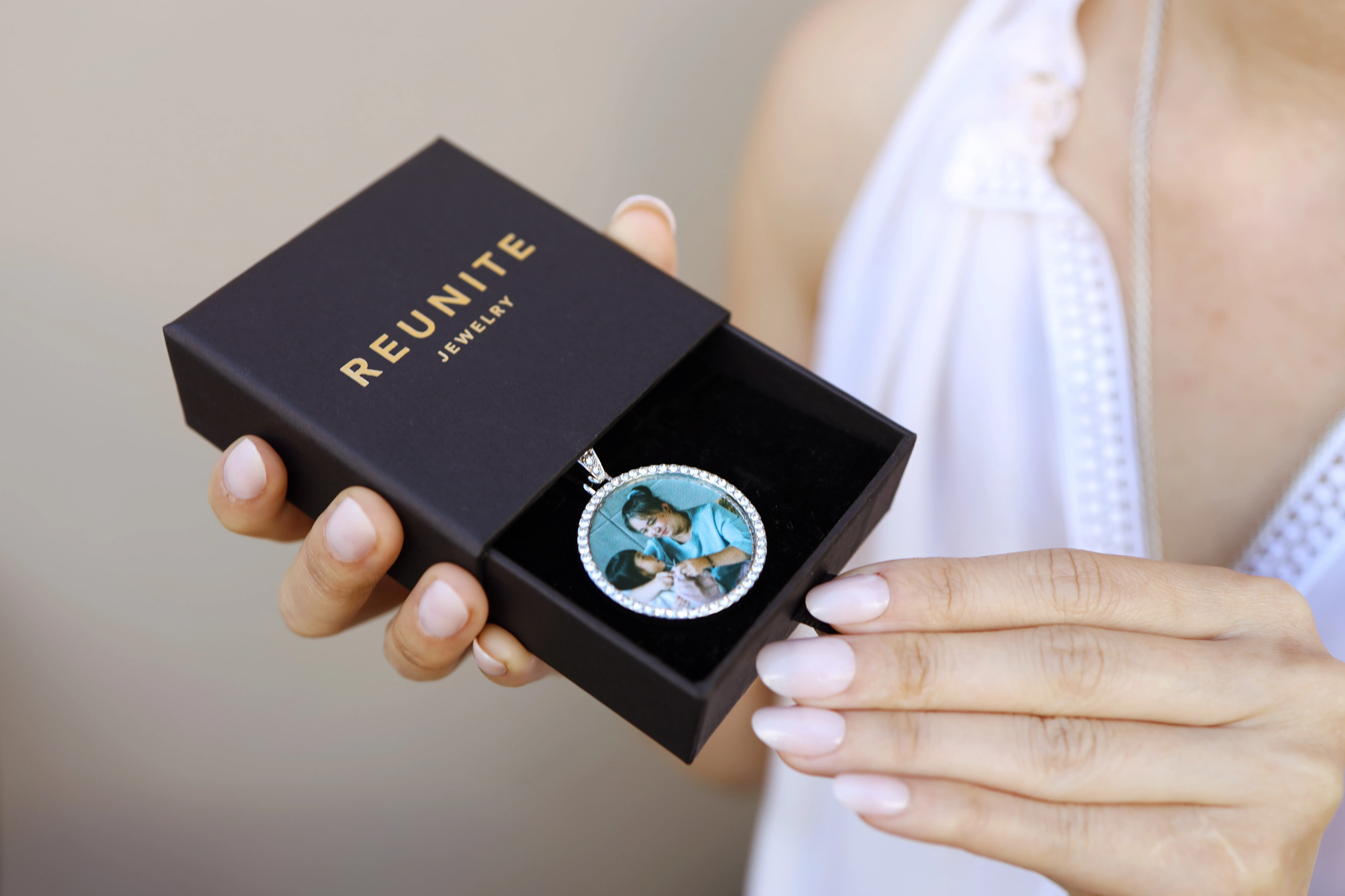 A personalized necklace featuring your favorite photo. A necklace with picture elegantly crafted to preserve cherished memories.